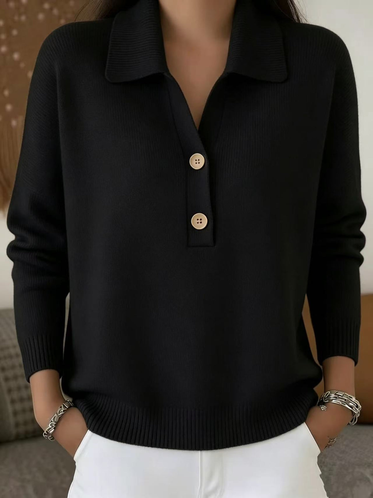 Pull ample à col polo boutonné, coloris noir