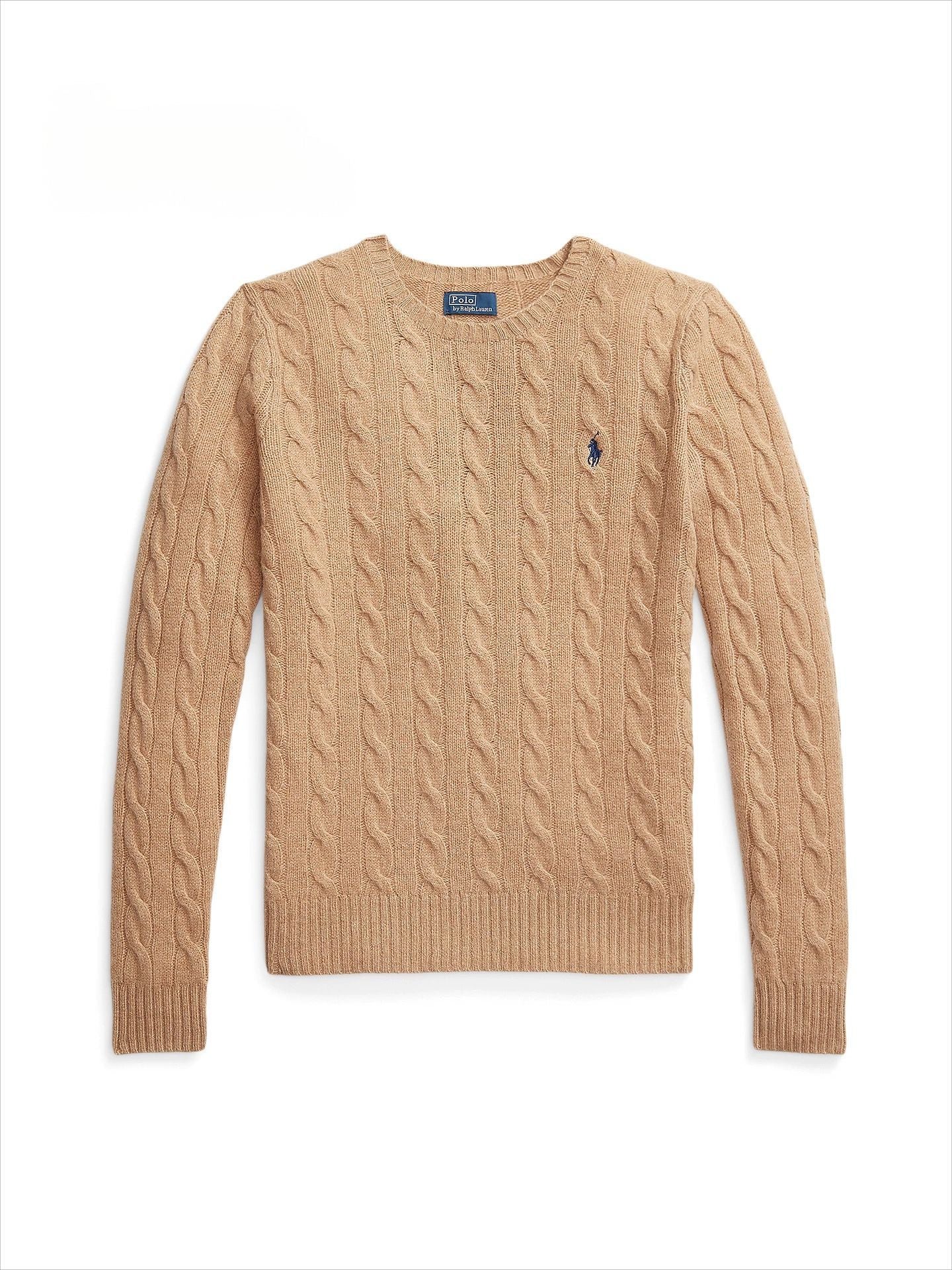 Pull col rond en maille torsadee, detail des torsades de manche